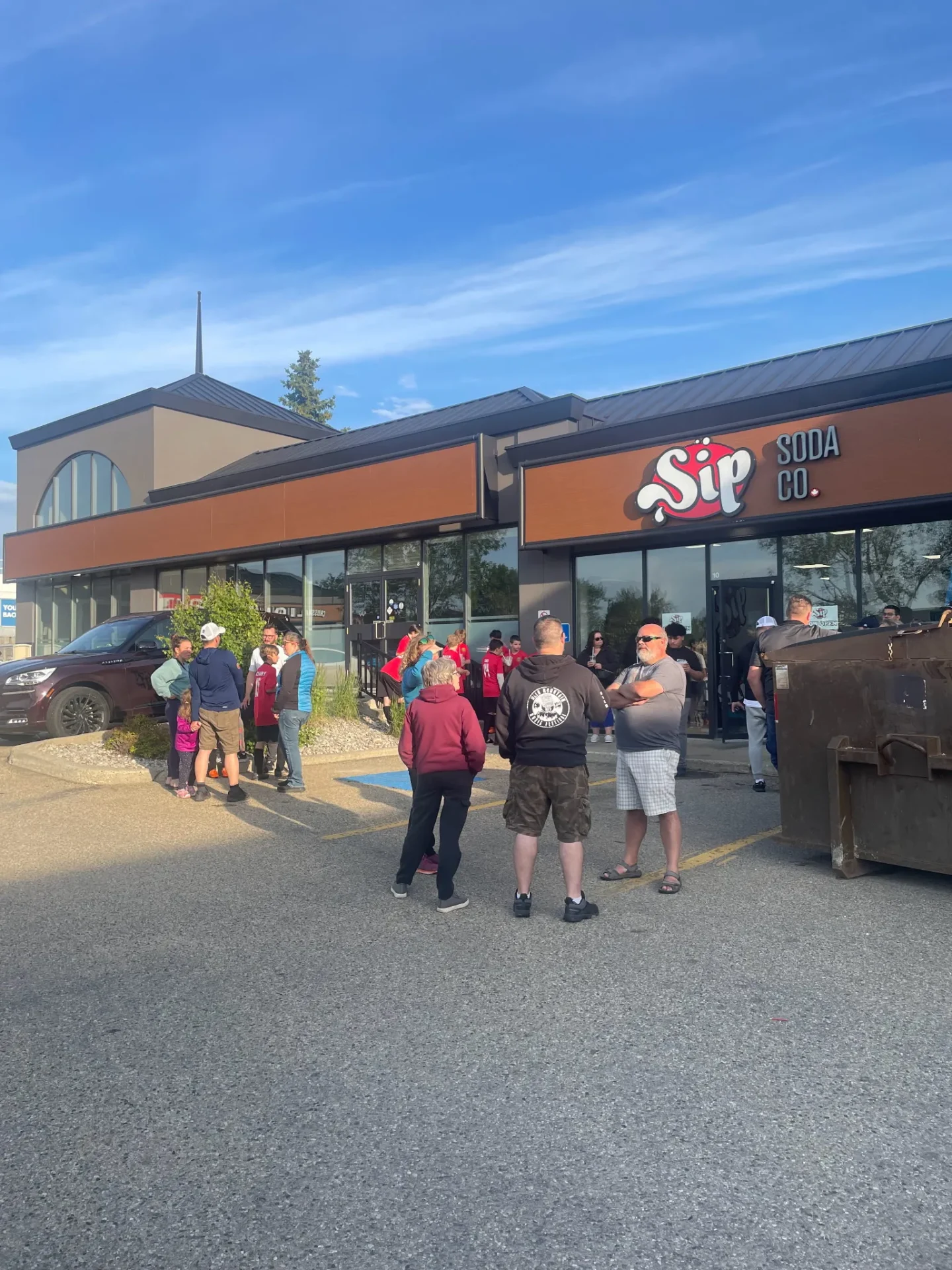 Group of customers at a Sip Soda location